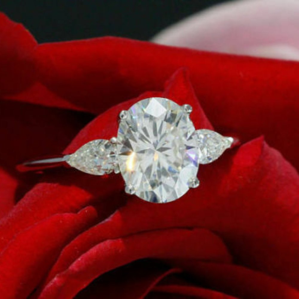 2.00 Ct Oval Cut Diamond with Pear Three Stone Ring Silver VVS1/D Moissanite